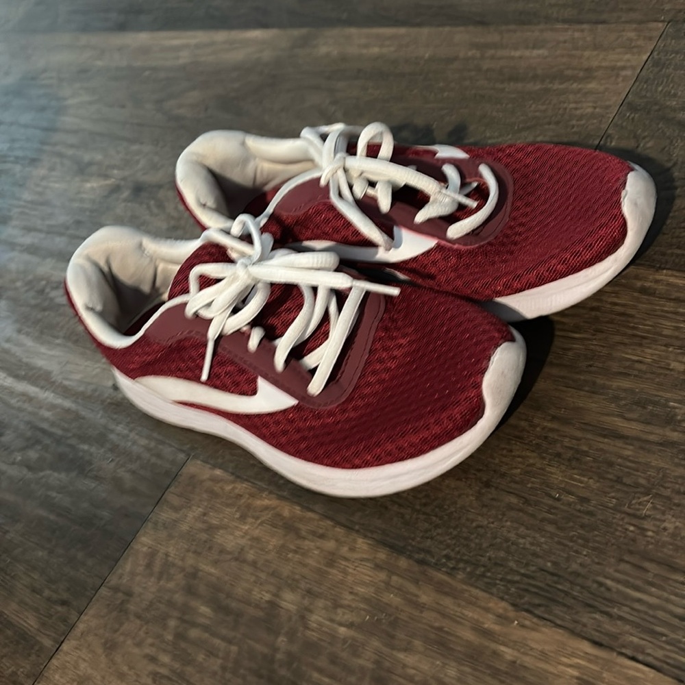 Maroon and white shoes